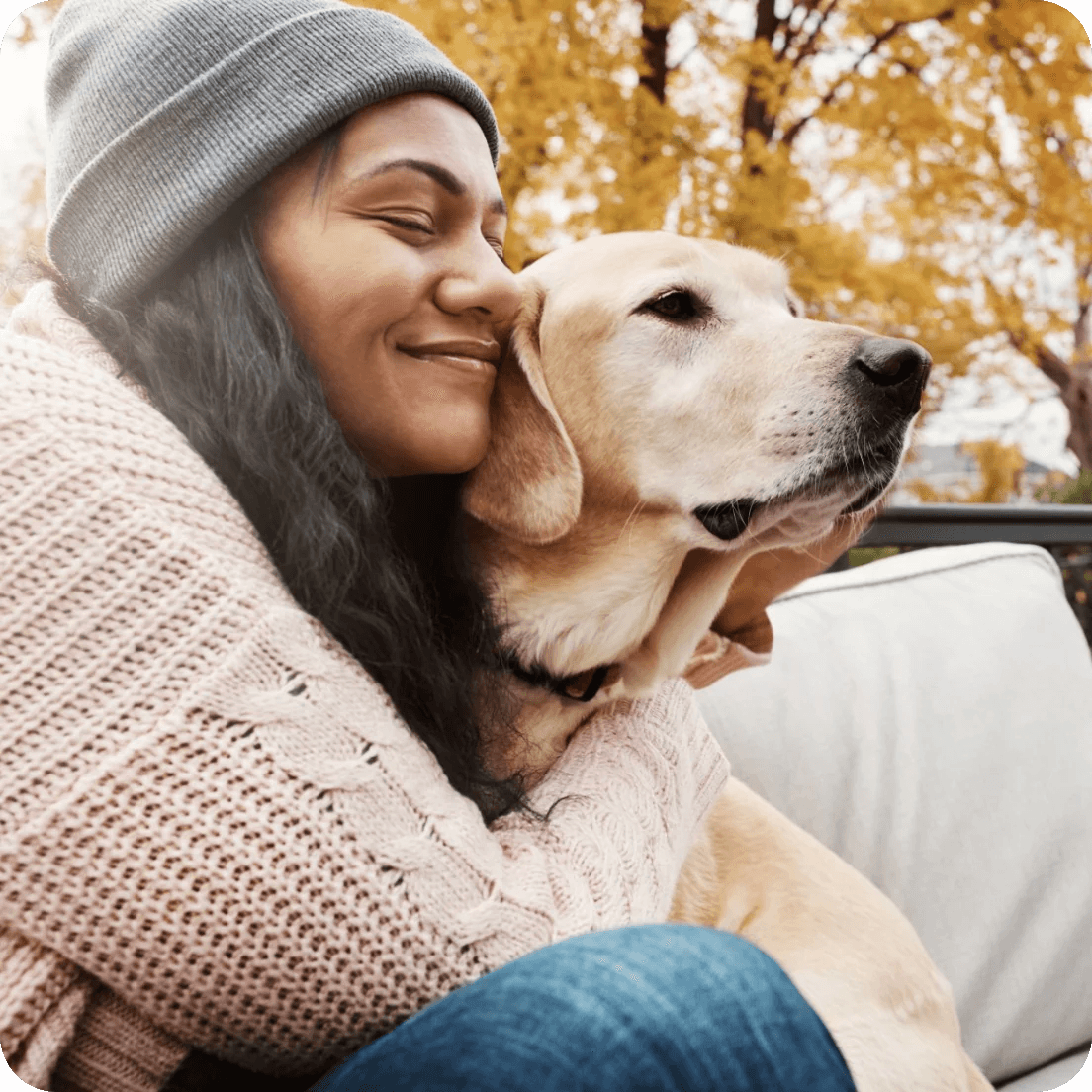 Woman hugging dog